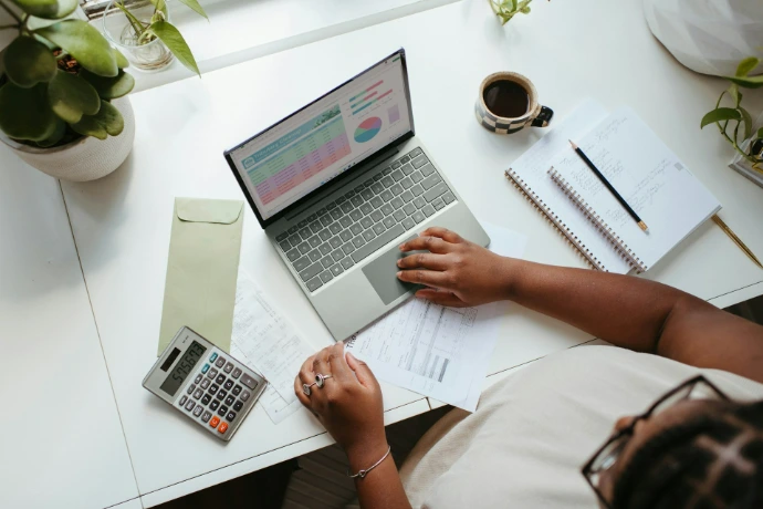 Visual graphic detailing outsourced accounting and bookkeeping services, including IFRS-compliant records, monthly reporting, and audit-ready books.